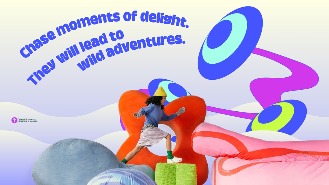A child climbing through colourful soft play under a Magical Kids poster